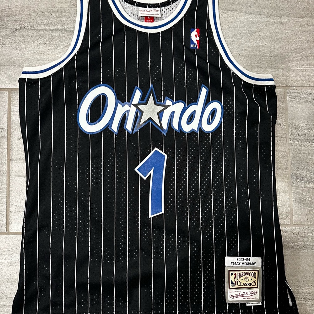 Mitchell & Ness Tracy McGrady #1 Orlando Magic 2003–04 Black Pinstripe Jersey